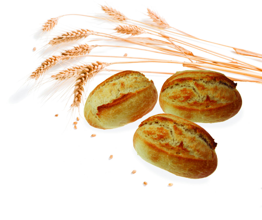 Loaves of french baguette bread tied together with paper and str